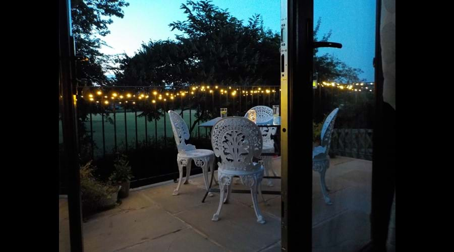 Raised terrace area overlooking the back garden