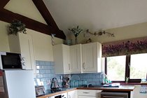 Kitchen with dish washer, oven/hob, 60/40 fridge freezer. There