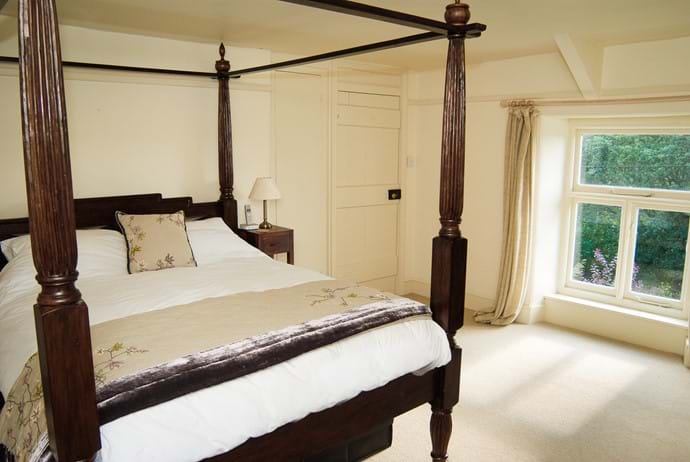 Four poster bed in the Master bedroom