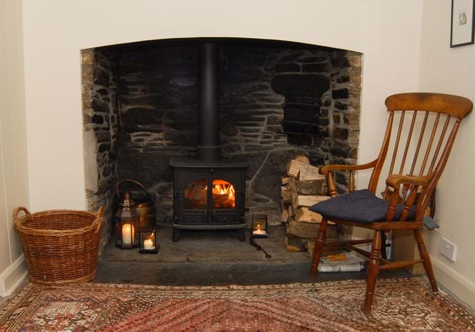 Cosy wood burner in the middle sitting room