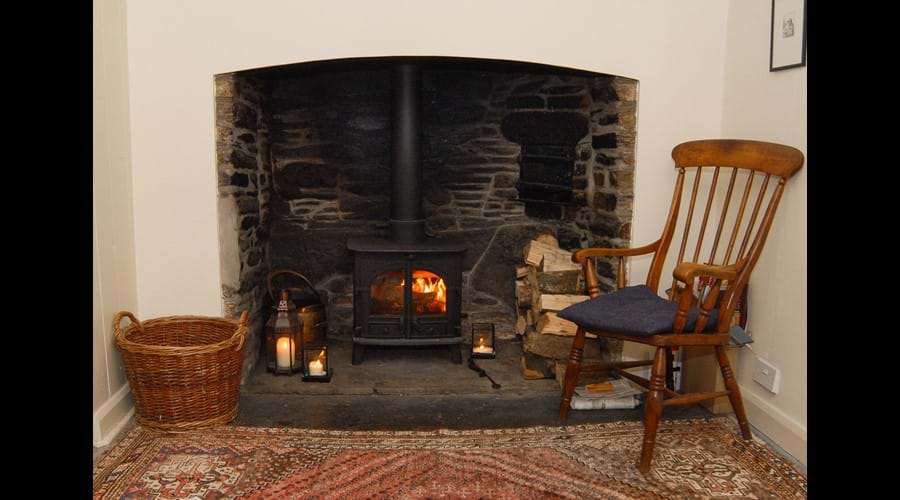 Cosy wood burner in the middle sitting room