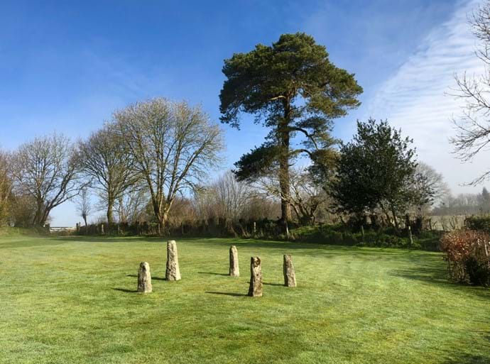 The stone circle, and view of the garden, looking towards our top gate.