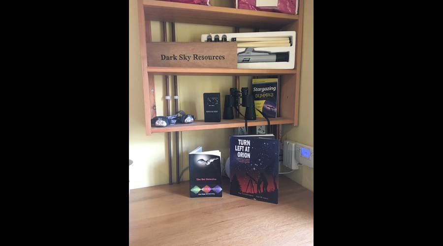 Telescope, binoculars, bat detector, red light torches, books, blankets