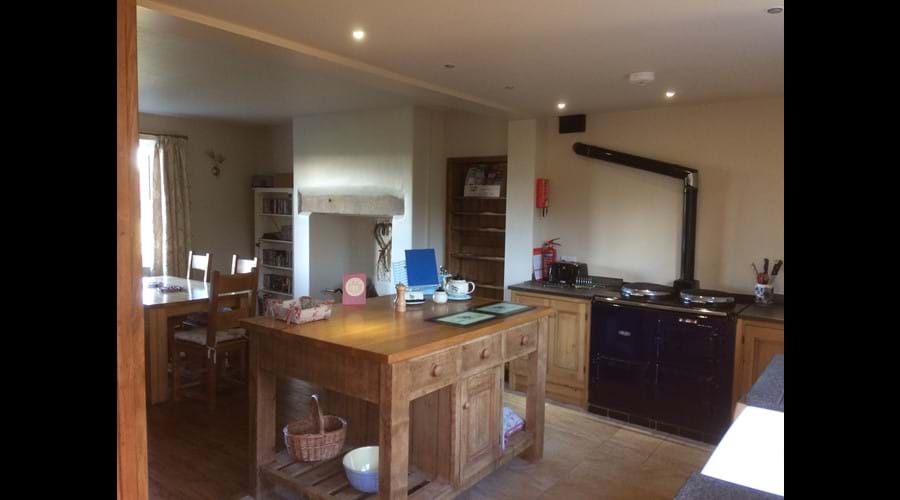 Bespoke wooden kitchen with electric Aga