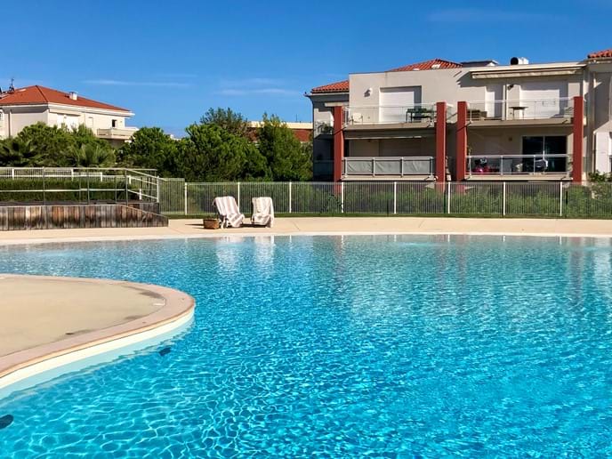 Constructed beach in one end of the pool