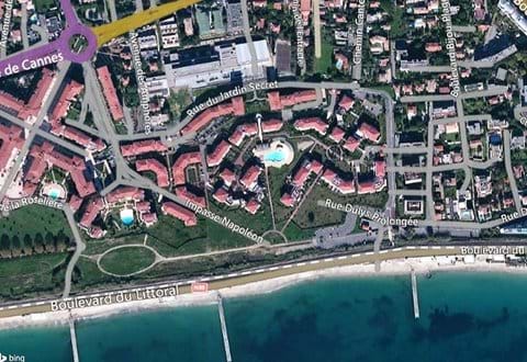 Aerial view of the domain Juan Flore with the pool in the middle, next to beach