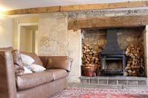 Main reception room with woodburner
