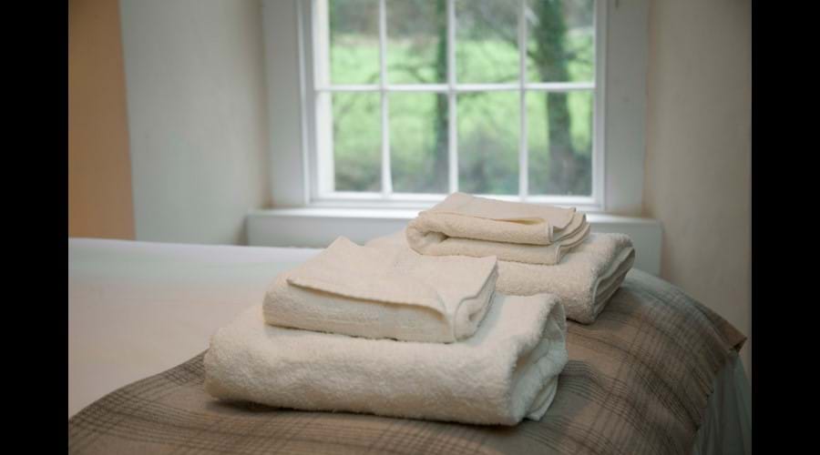 Luxury cotton linen and fluffy white towels are provided