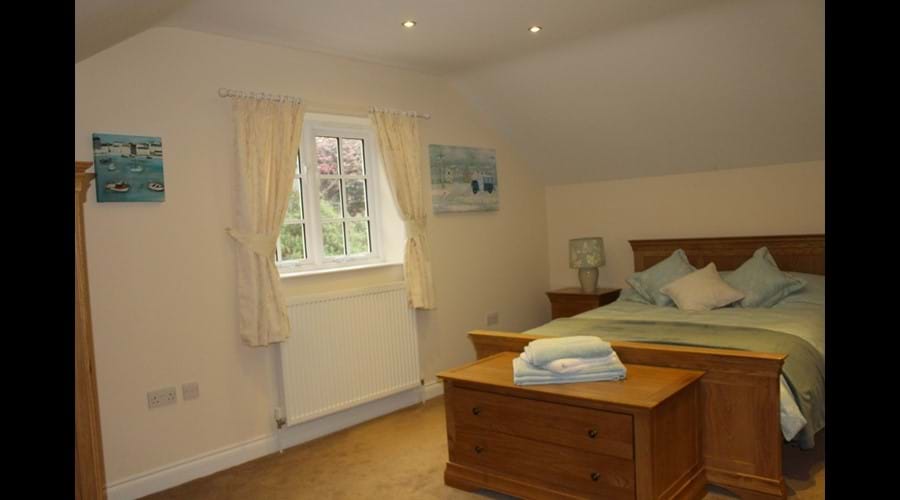 Master bedroom with king-size bed