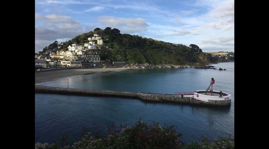 Looe harbour and sandy beach