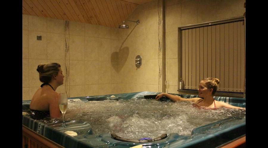 Relax in the indoor hot tub