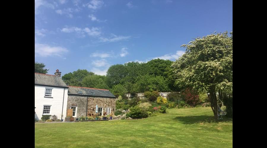 Relax in the peaceful garden or kick a ball with the children