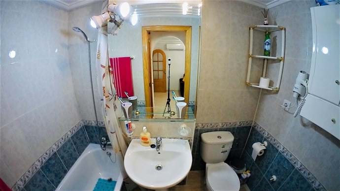 Holiday apartment - bathroom, over the bath shower