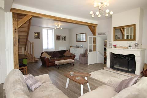 Spacious lounge with views onto the terrace and garden