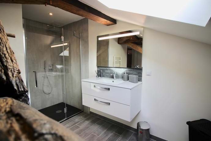 Ensuite to Bed 1 - large rainfall shower and vanity basin unit