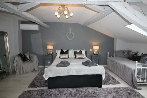 Bedroom 1 with King size and single beds