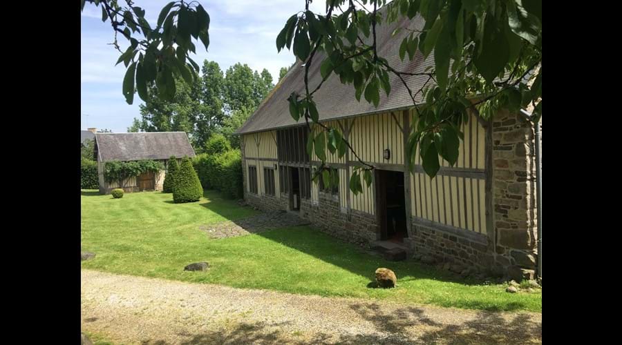 The Barn which has four bedrooms and sleeps eight/nine with extensive reception space