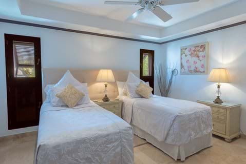 Bedroom 2 at Coral Cove 12, set up with full sized twin beds. Can be set with king size beds.