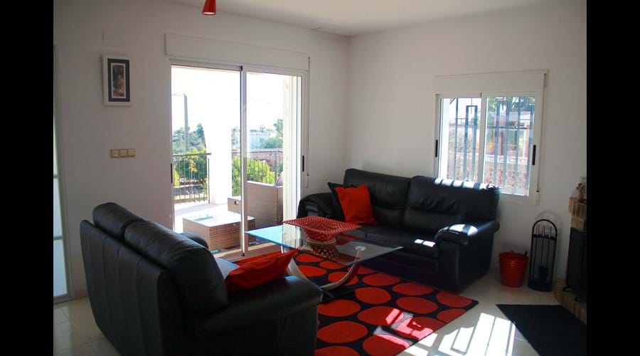 Comfortable Lounge with patio doors to the terrace and the views beyond