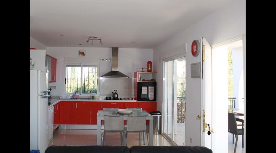 Kitchen with views both to the side and the front of the villa
