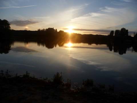Sunset at Marçon lake.