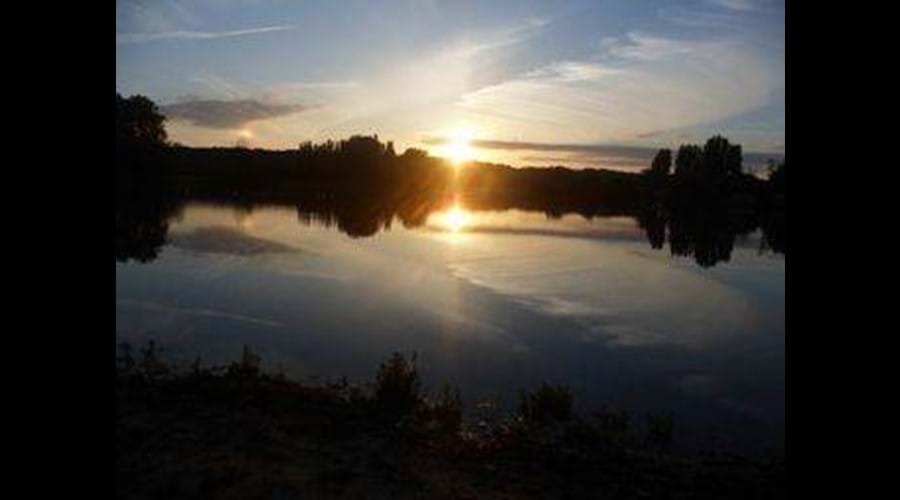 Marçon Lake at sunset