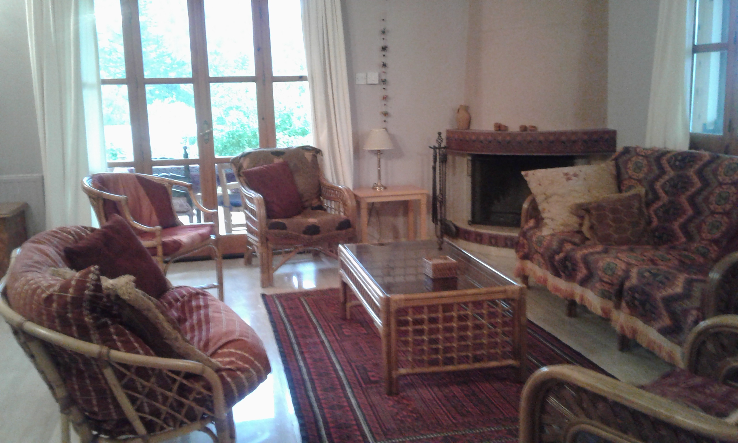 Sitting room with french windows to the terrace