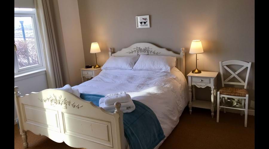 Bedroom 1 - King Size bed with dresser, wardrobe and built in wardrobe