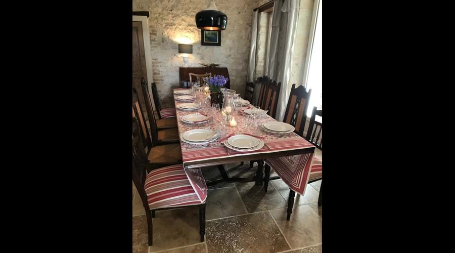 12 settings at dining room table Maison La Busaneth Lot-et-Garonne