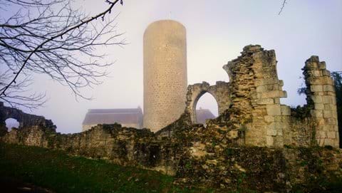 Tower of Chateau Chalus Chabrol in slightly misty light during the Winter