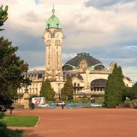 Limoges railway station with clock tower and dome in art deco period