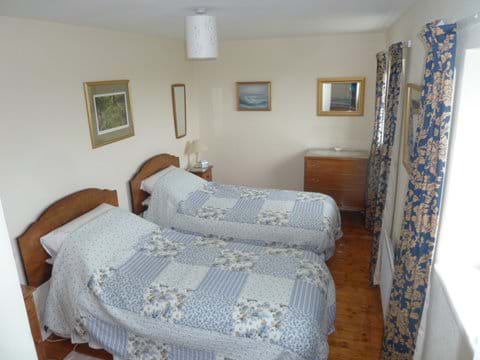 Twin bedroom in Smeale Farm Cottage.