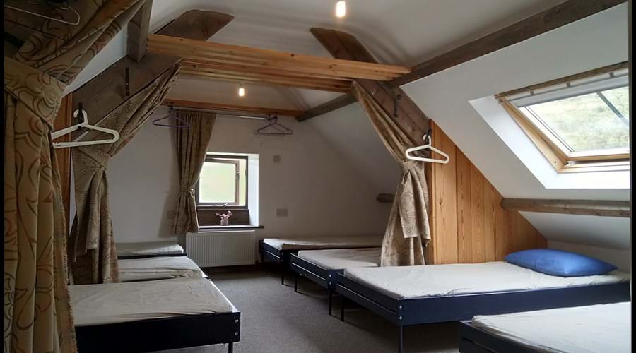 Luxury Bunkbarn dorm from stairs, 8 singles 1 bunk