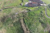 Drone photo of garden, bunkbarn and attached farmhouse