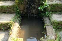 Running water in garden near fire pit & bbq