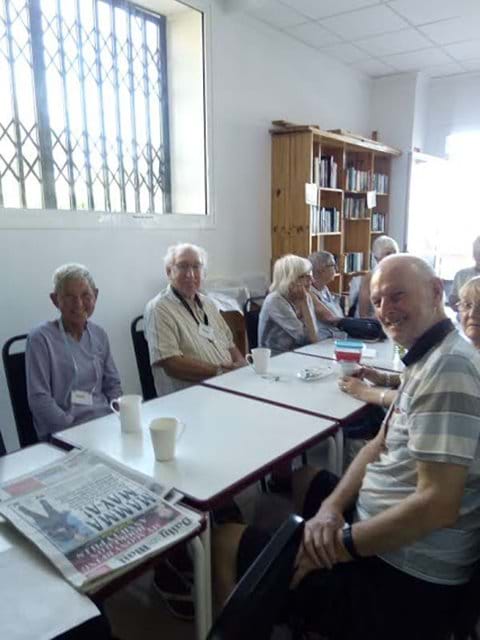 Barb, Malc, Diane and others enjoying morning tea and coffee.