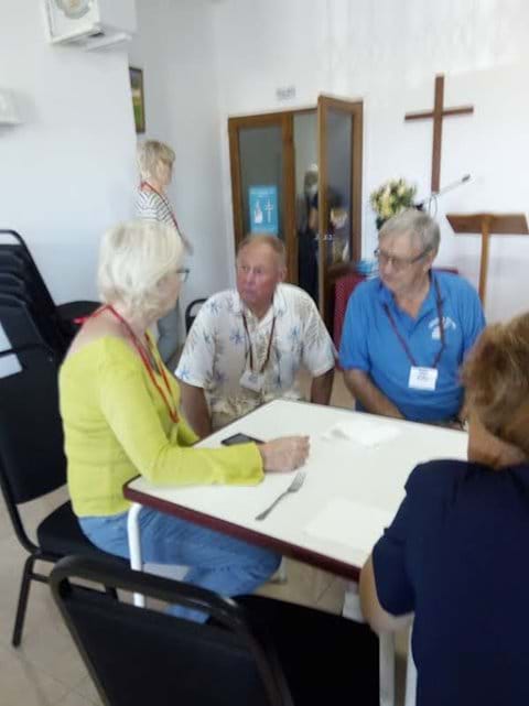Paul (centre) chatting with Group members Diane and Colin.