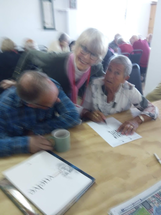 Paul and Pat doing their crossword