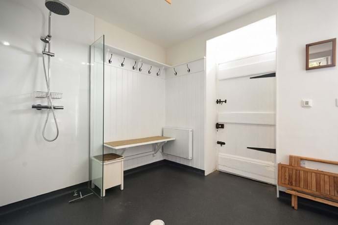 Wet room with access directly onto the square & shower to wash down after the beach