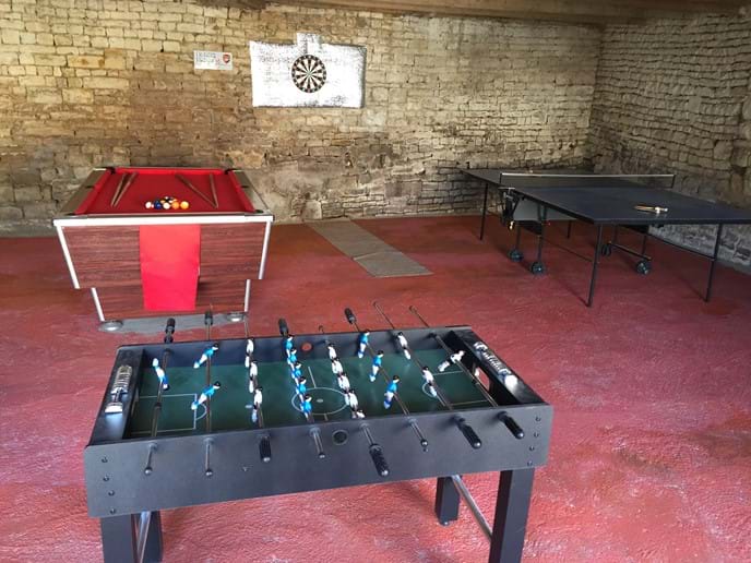 games room with full size pool table, full size table tennis table and table football