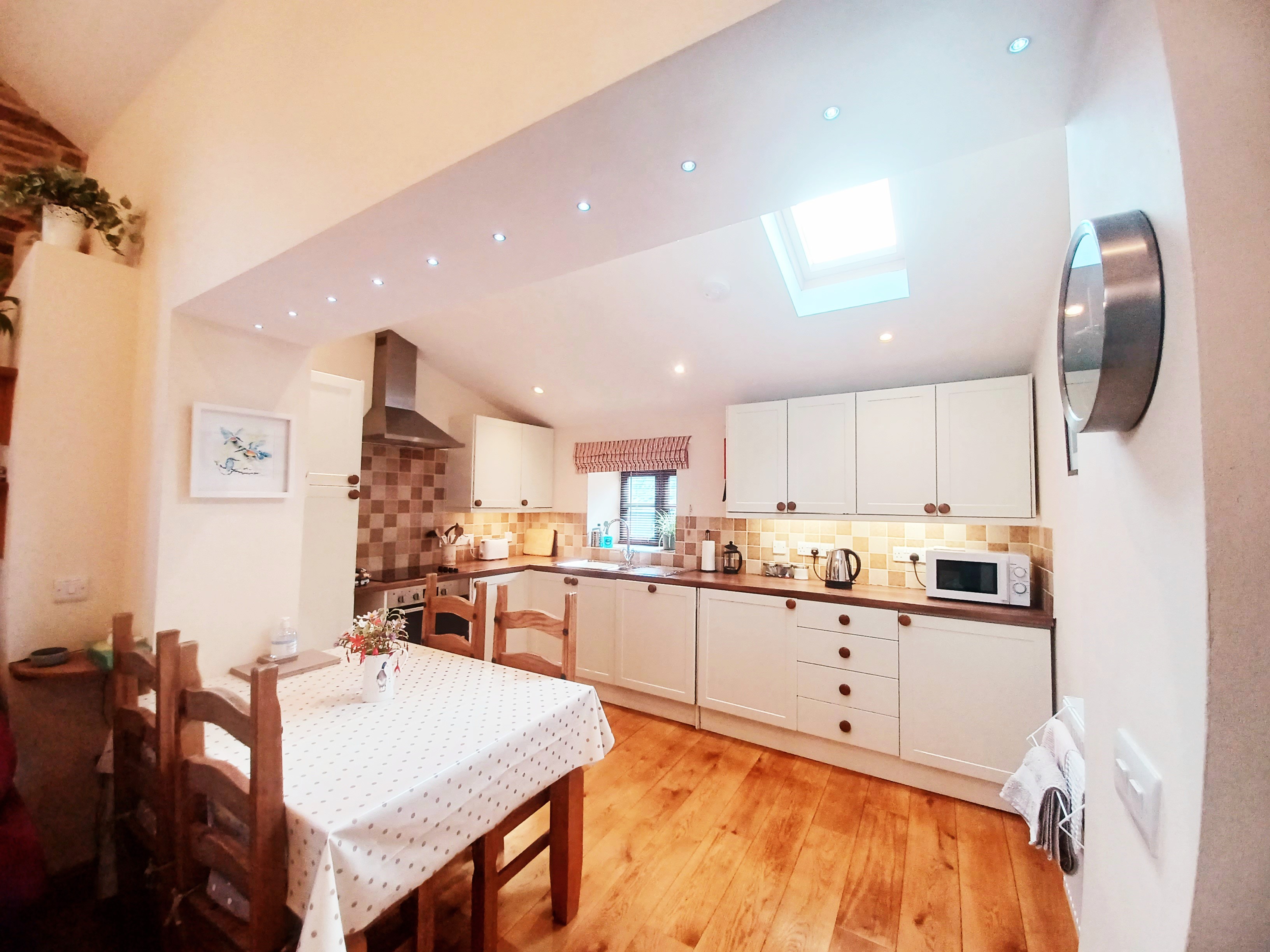 The dining table can extend to accommodate up to 6 guests.