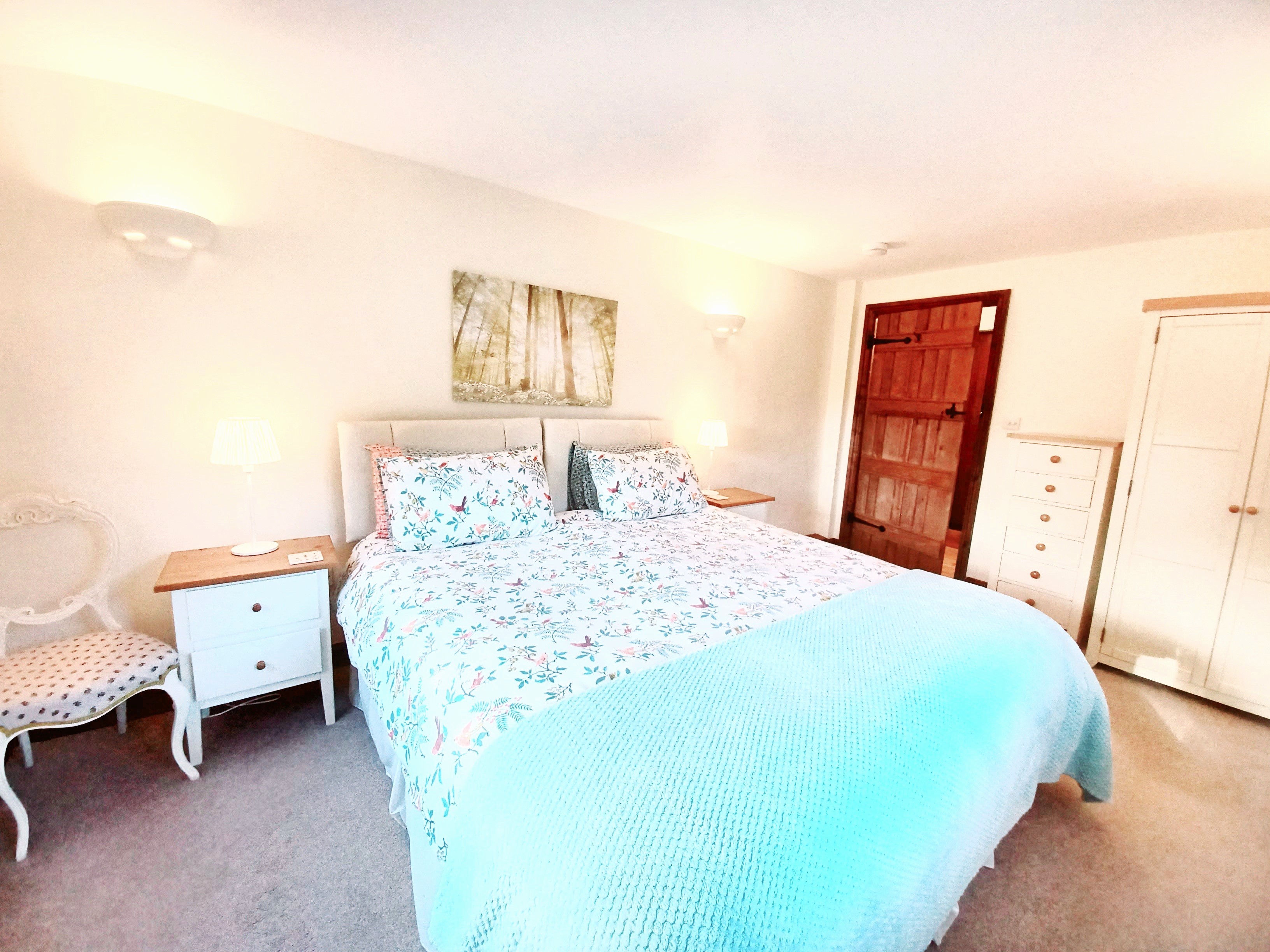 A generous bedroom with Super King size bed which can also be configured as 2 x 3ft single beds.