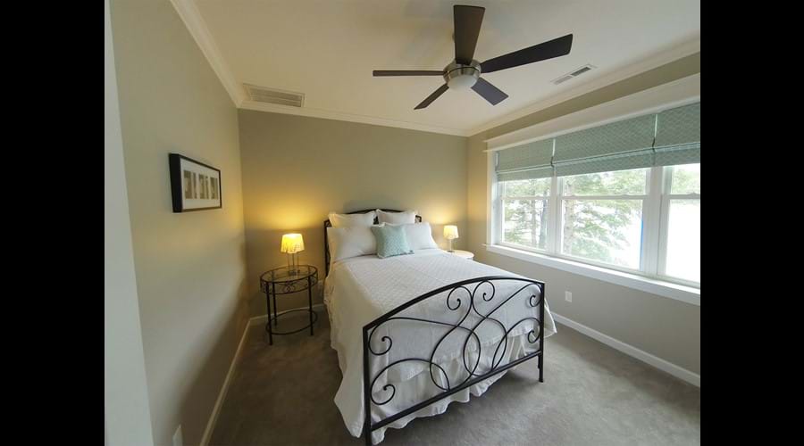 Bedroom 3 on First Floor. Large window with lake view