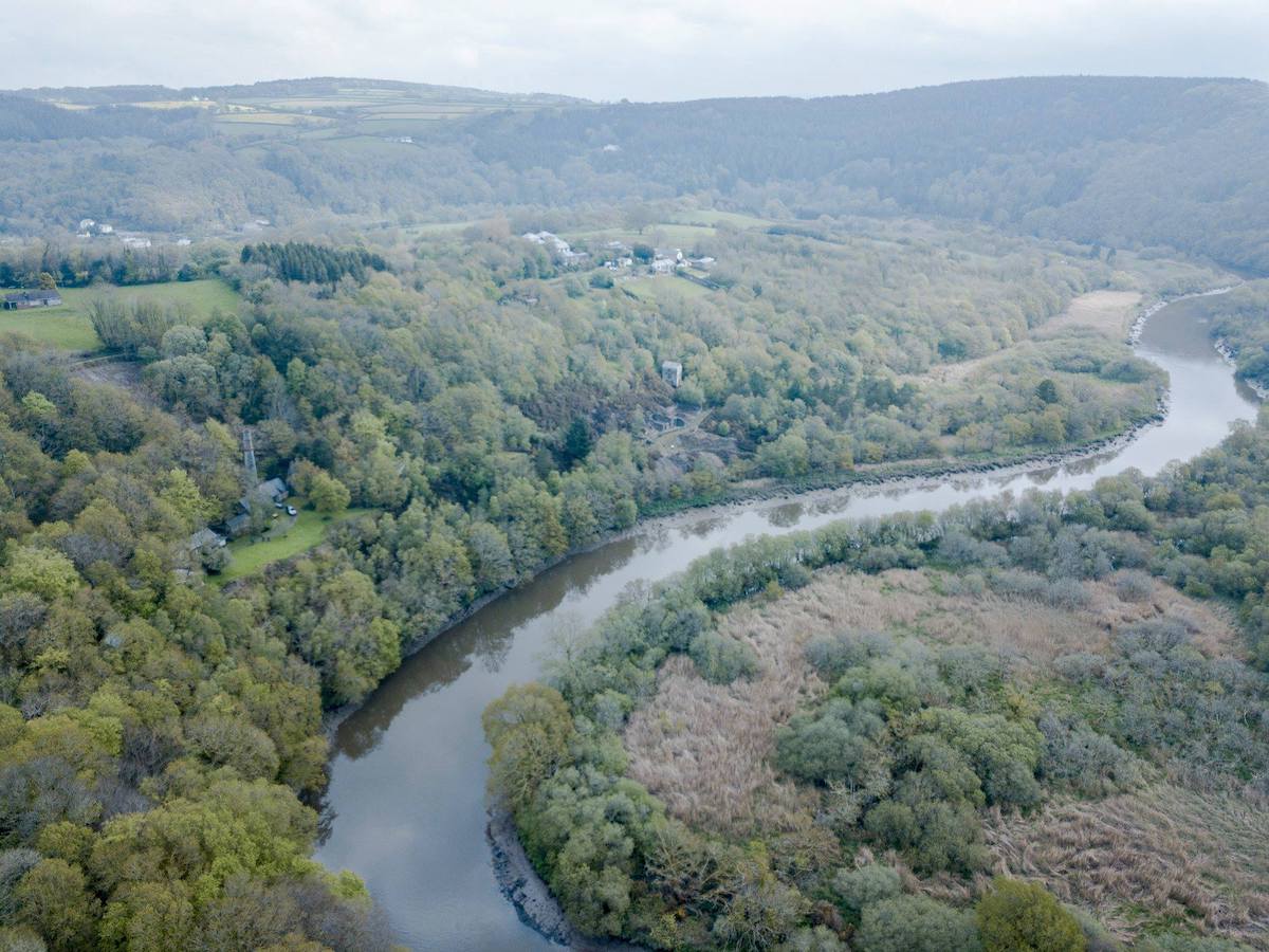 Tamar meandering past Okel Tor (copyright Keith Savory)