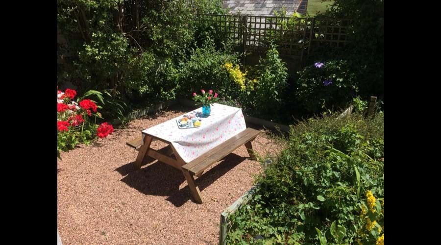 Take tea in the enclosed courtyard garden