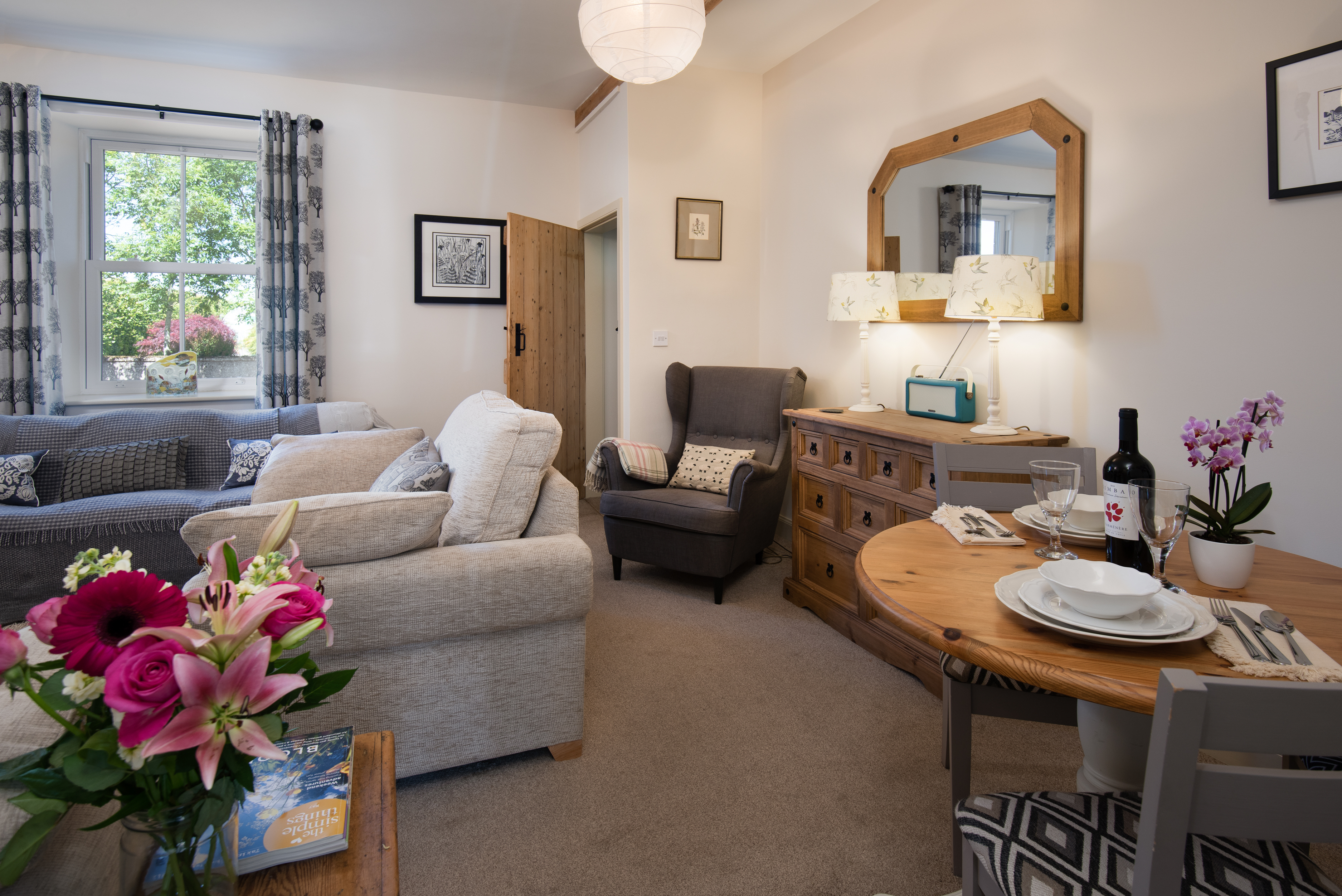 The chest of drawers in the living room houses a huge selection of DVDs and a DAB radio which will connect with your smart device enabling you to listen to your own playlist or podcasts via Bluetooth.