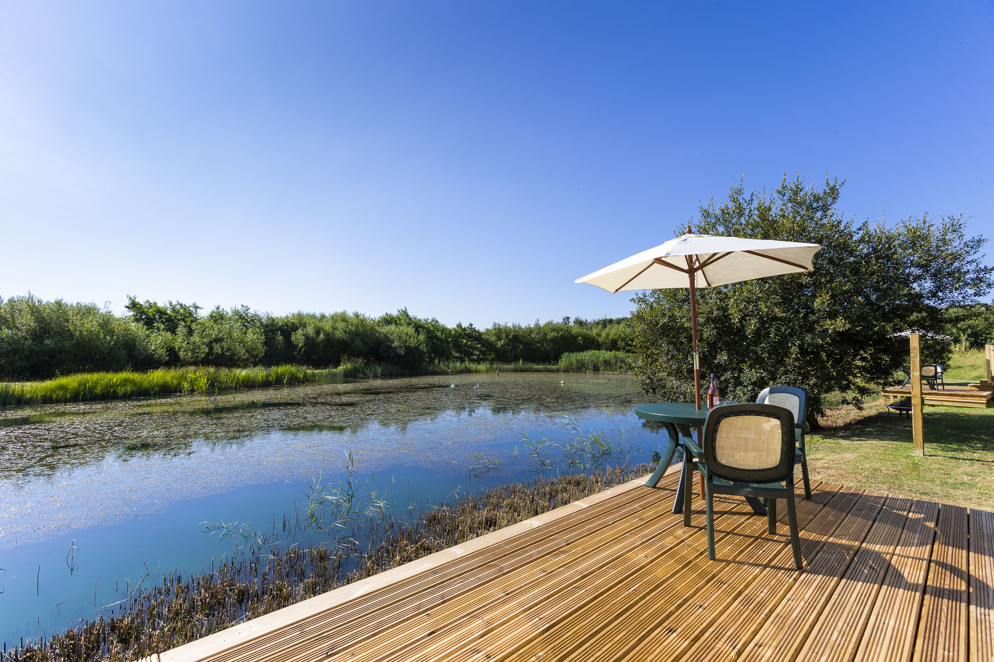 Sandpiper private decking with BBQ and fire pit