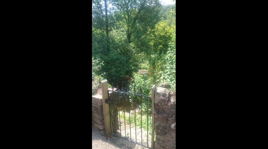 gate and steps down to the river garden
