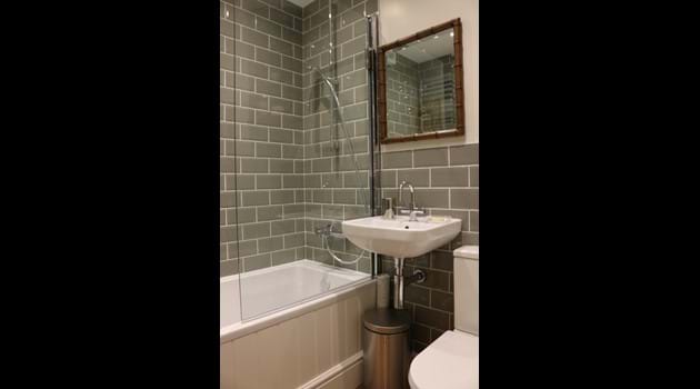 Family bathroom - bath with shower over and plenty of hot water