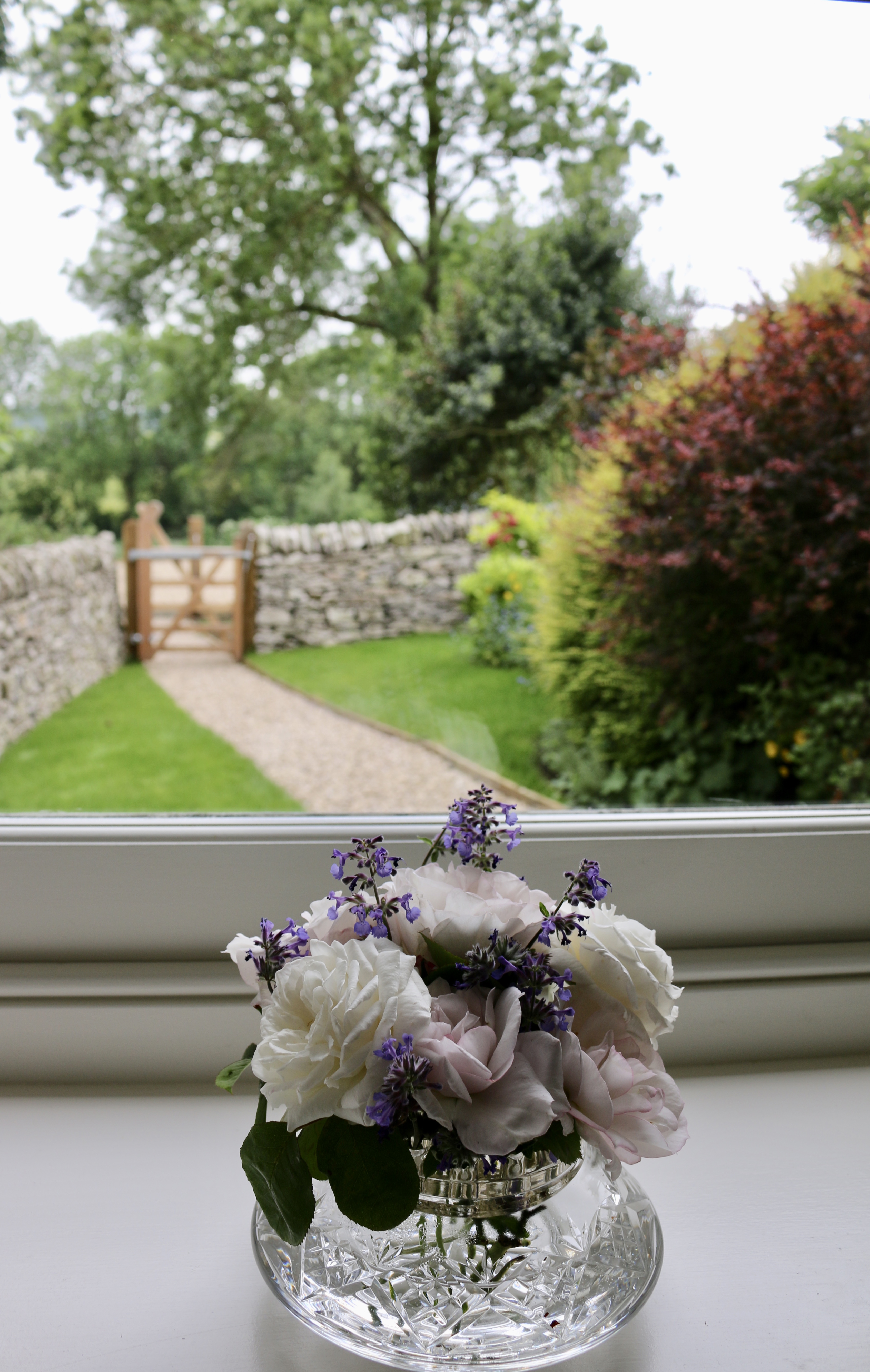 Fresh garden flowers in the bedroom